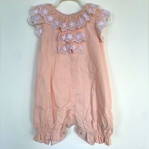 Tutu du Monde baby romper. Size 6-12 months. Light pink with white star lace.